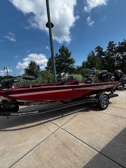 Ranger RT188P 2025 Ranger RT188P boat on trailer, red color, parked outdoors under blue sky.