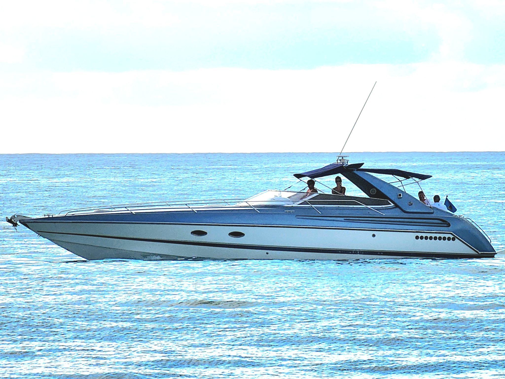 Sunseeker Tomahawk 41 1995 Sunseeker Tomahawk 41 yacht cruising on calm blue waters.