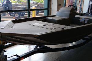 Tracker Grizzly 1648 SC 2026 Tracker Grizzly 1648 SC boat displayed indoors, showcasing its sleek design and sturdy build.