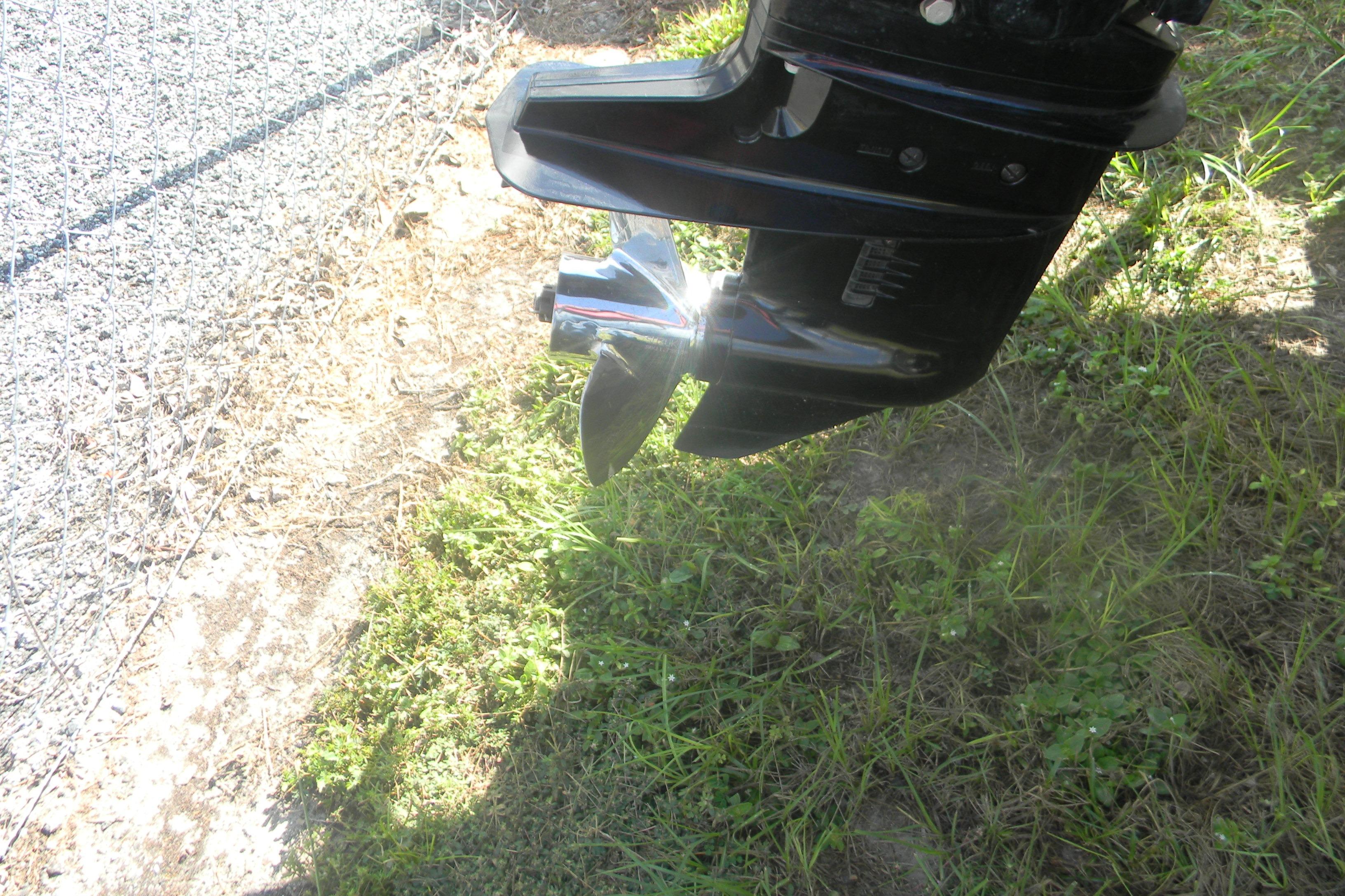 SeaArk 1660 c/c 2023 SeaArk 1660 c/c boat motor propeller on grassy terrain.