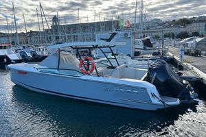 Saxdor 270 GTO 2024 Saxdor 270 GTO boat docked in a marina with surrounding yachts.