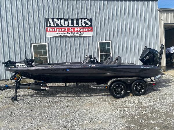 Triton 21 TrX 2020 Triton 21 TrX boat parked outside Angler's Outpost & Marine.