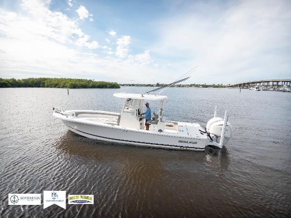 Regulator 30XO 2024 Regulator 30XO boat on calm water with clear sky.