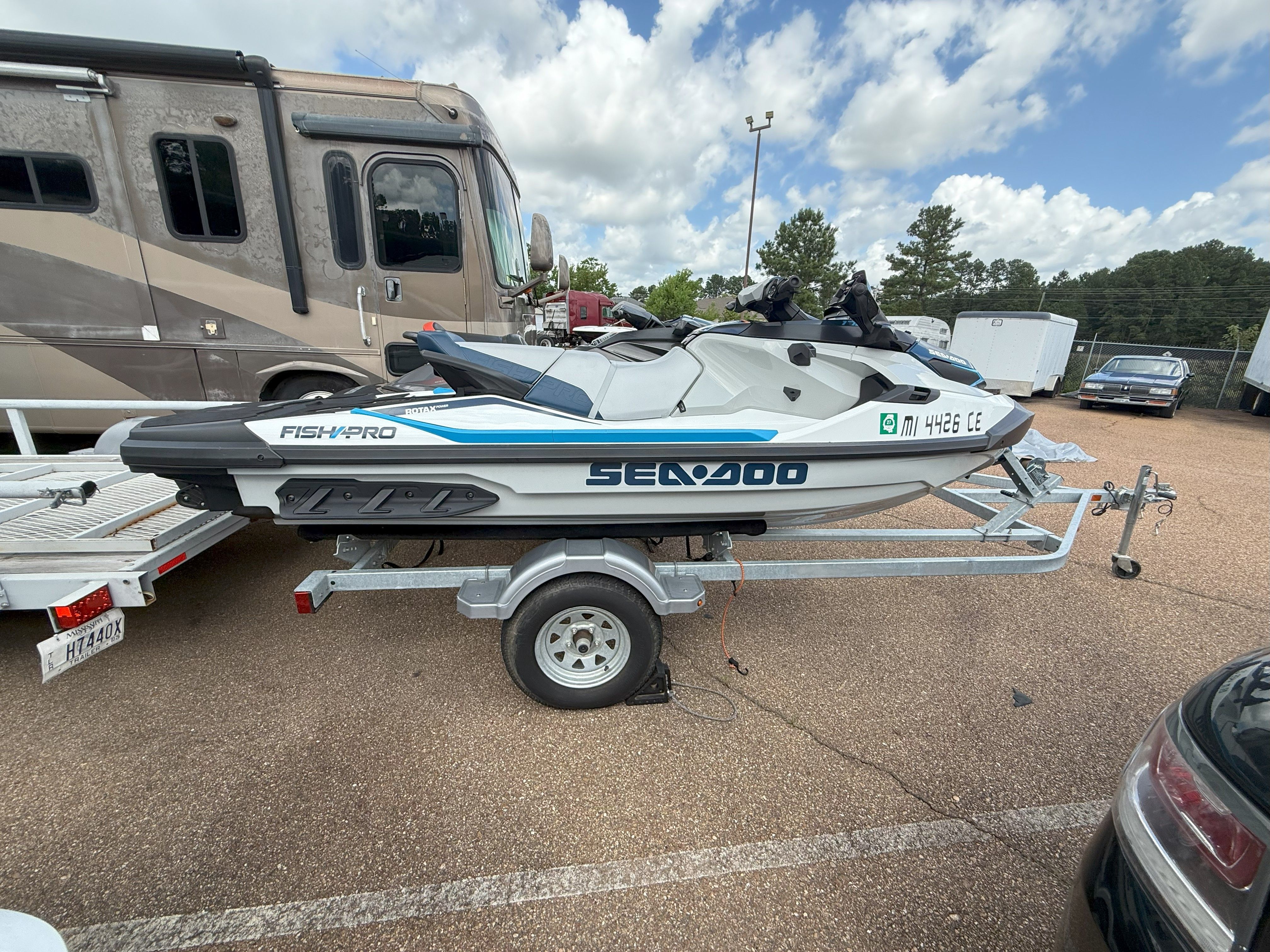 Bombardier SeaDoo FishPro Sport 170 iDF 2023 Bombardier SeaDoo FishPro Sport 170 iDF on trailer, parked outdoors.