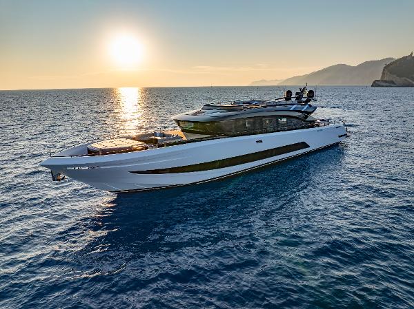 AB 110 Luxurious 2026 AB 110 yacht cruising at sunset on serene ocean waters.
