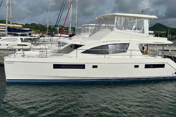 Leopard 51 Powercat 2019 Leopard 51 Powercat yacht docked in marina, side view.