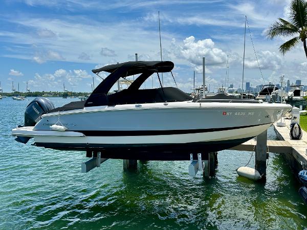 Chaparral 267 SSX OB 2022 Chaparral 267 SSX OB boat docked at marina.