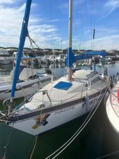 Gib'Sea 26 1977 Gib'Sea 26 sailboat docked in a marina under a clear blue sky.