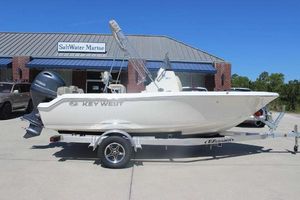 Key West 188 Bay Reef 2025 Key West 188 Bay Reef boat on trailer outside SaltWater Marine store.