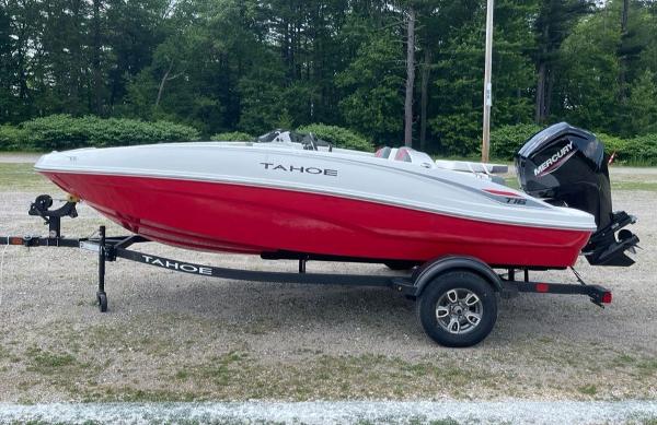 Tahoe T16 2025 Tahoe T16 boat on trailer, red and white design, parked outdoors.