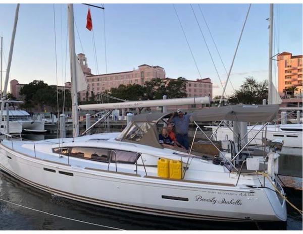 Jeanneau Sun Odyssey 44 DS 2017 Jeanneau Sun Odyssey 44 DS yacht docked at marina, with people on deck.
