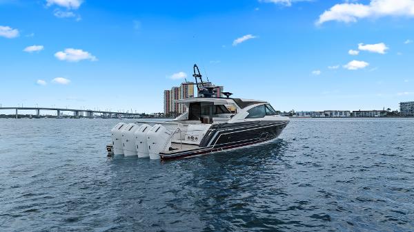 Formula 500 Super Sport Crossover 2025 Formula 500 Super Sport Crossover yacht on water, cityscape and bridge in background.