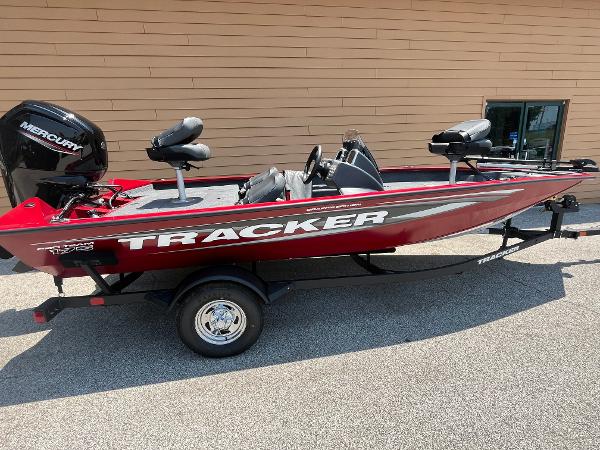 Tracker Pro Team 175 Crappie Edition 2025 Tracker Pro Team 175 Crappie Edition boat with Mercury engine, red color, on trailer.