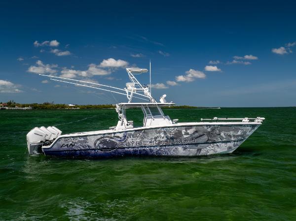 Freeman 37 VH 2023 Freeman 37 VH boat on green water under blue sky.
