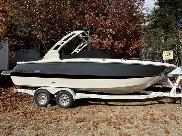 Chaparral 247 SSX 2025 Chaparral 247 SSX boat on trailer, surrounded by autumn foliage.