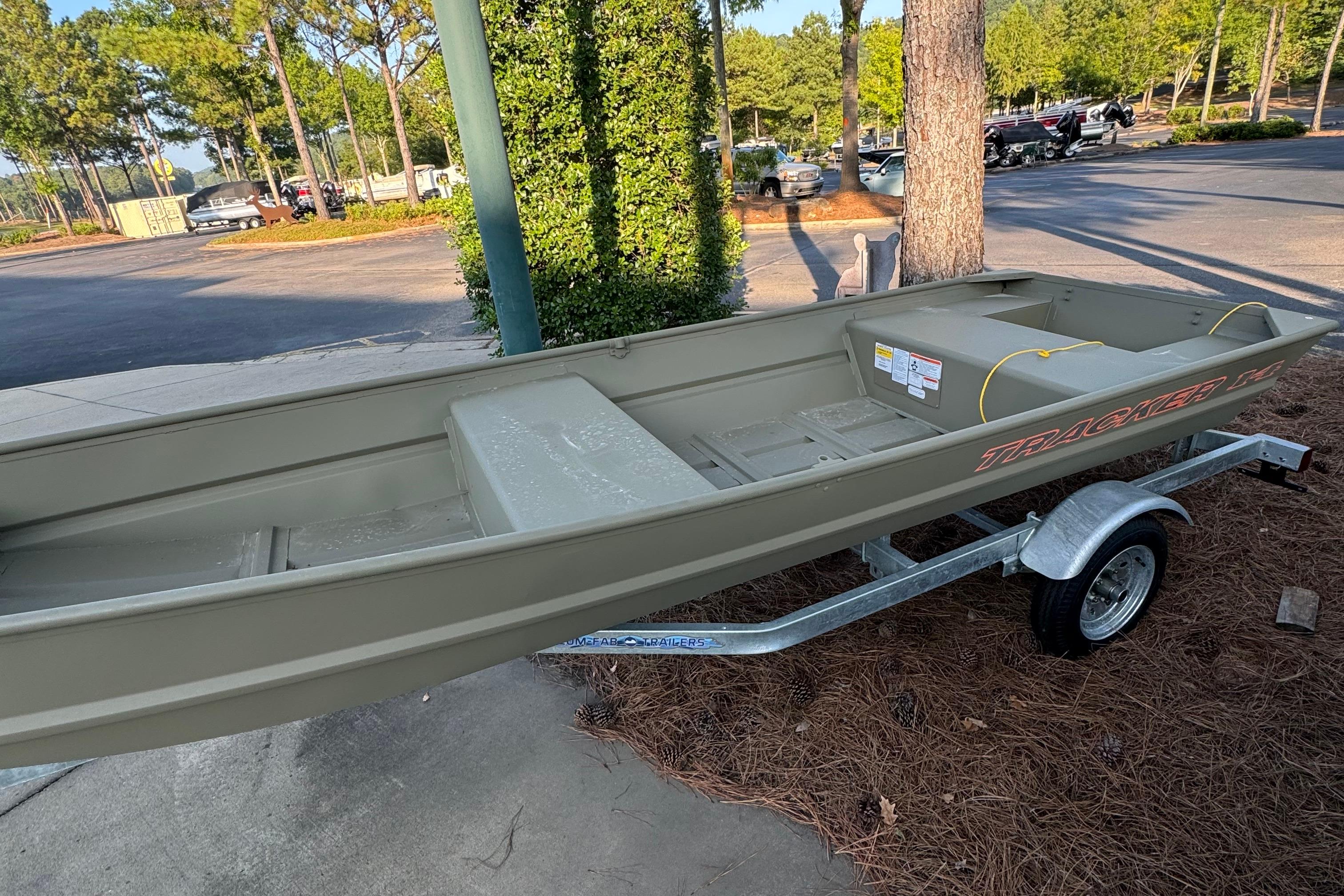 Tracker Grizzly 14 Jon 2026 Tracker Grizzly 14 Jon boat on trailer, parked outdoors.