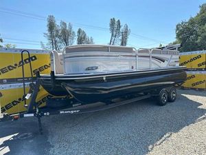 Ranger Reata 223C 2023 Ranger Reata 223C pontoon boat on trailer, parked outdoors.