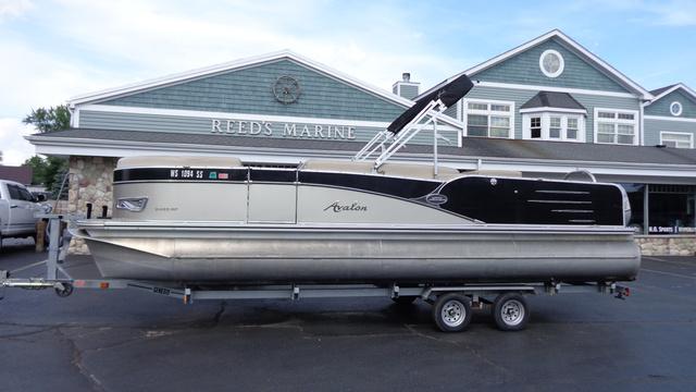 Avalon Wind Jammer 2014 Avalon Wind Jammer pontoon boat on trailer at Reed's Marine.