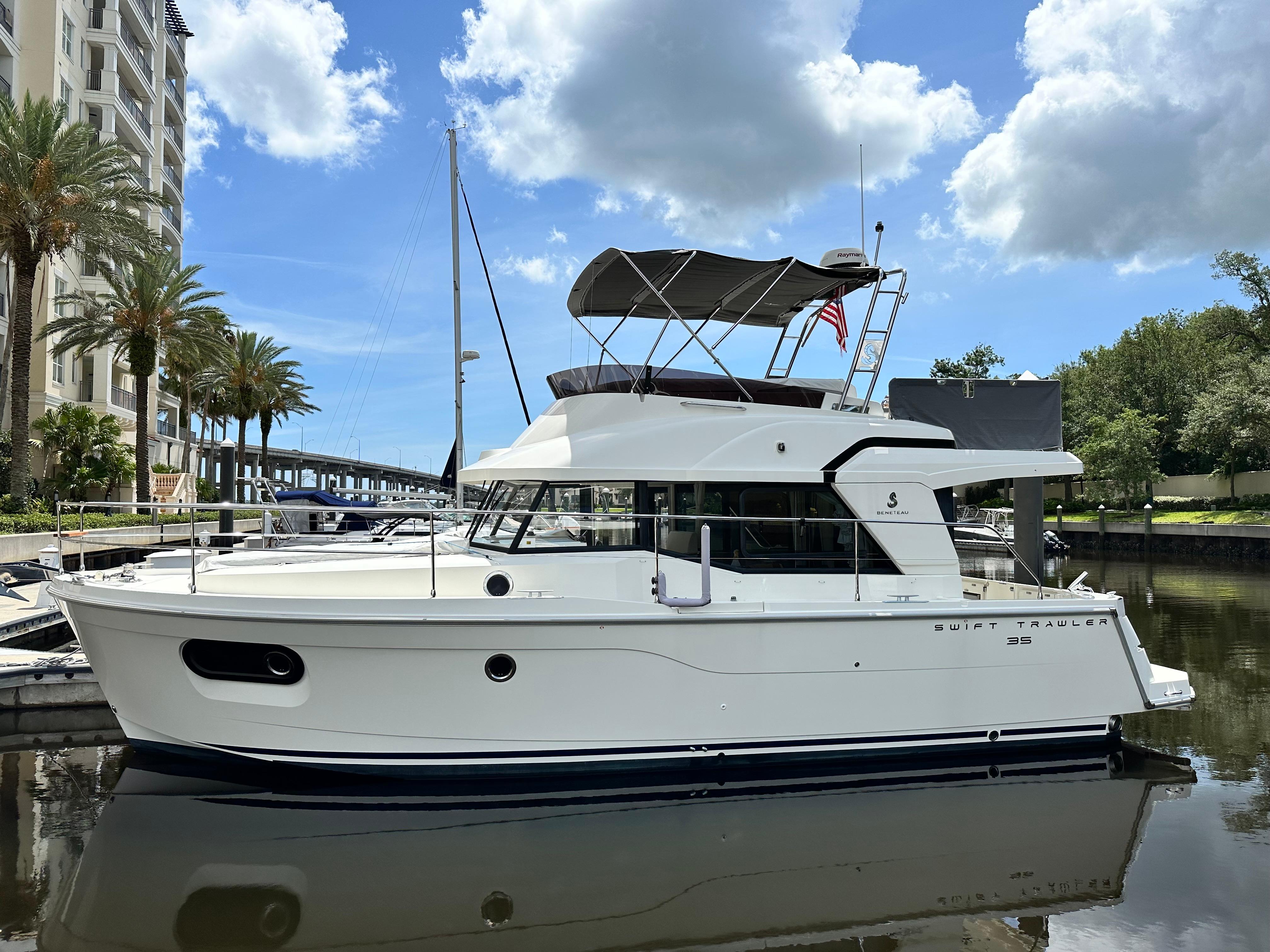 Beneteau Swift Trawler 35 2022 Beneteau Swift Trawler 35 docked, featuring sleek design and modern amenities.