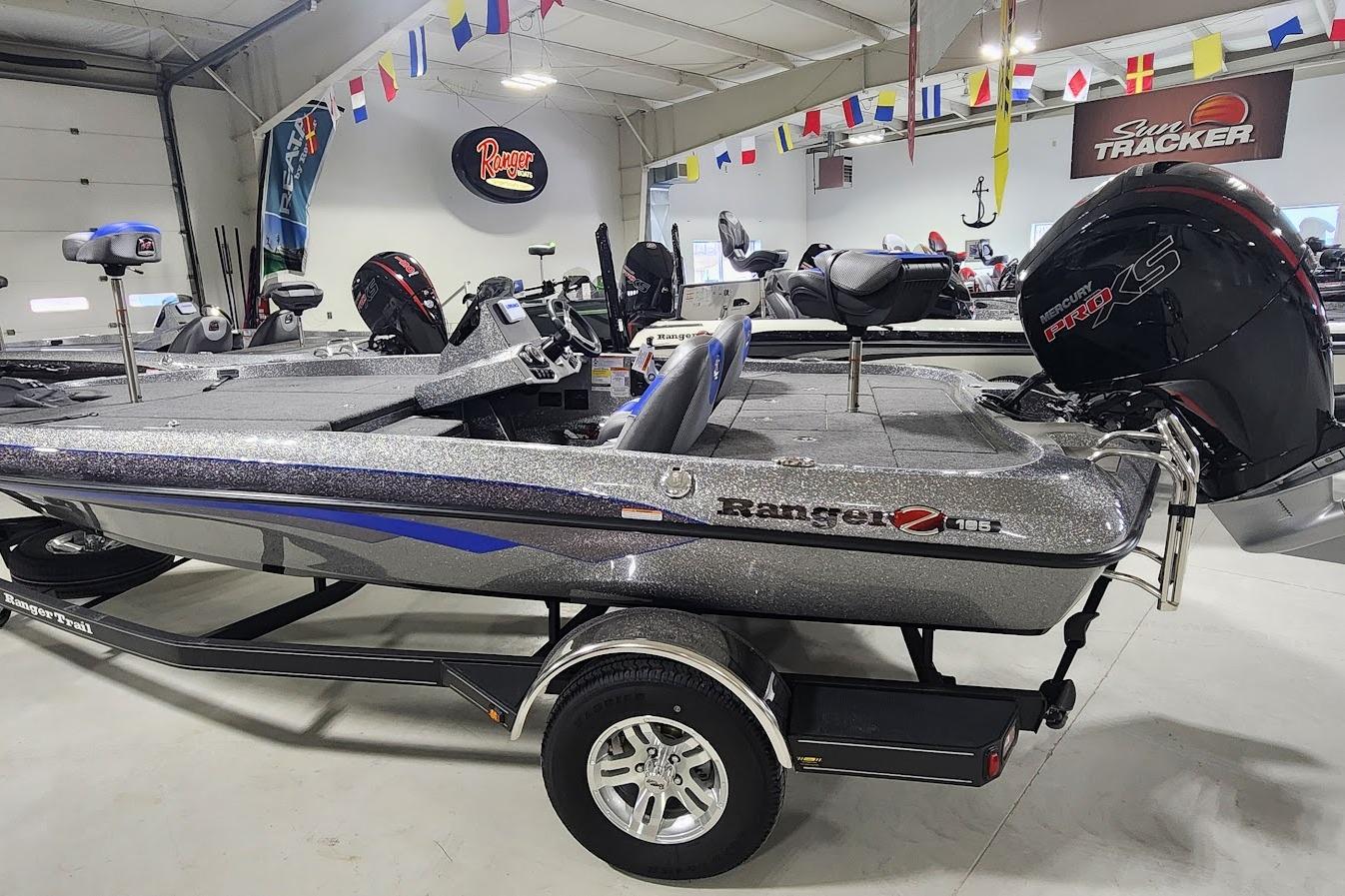 Ranger Z185 2025 Ranger Z185 boat in showroom, featuring sleek design and Mercury Pro XS engine.