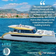 Luna 47 Luxury catamaran Luna 47 cruising near scenic coastline, showcasing advanced technology and craftsmanship.