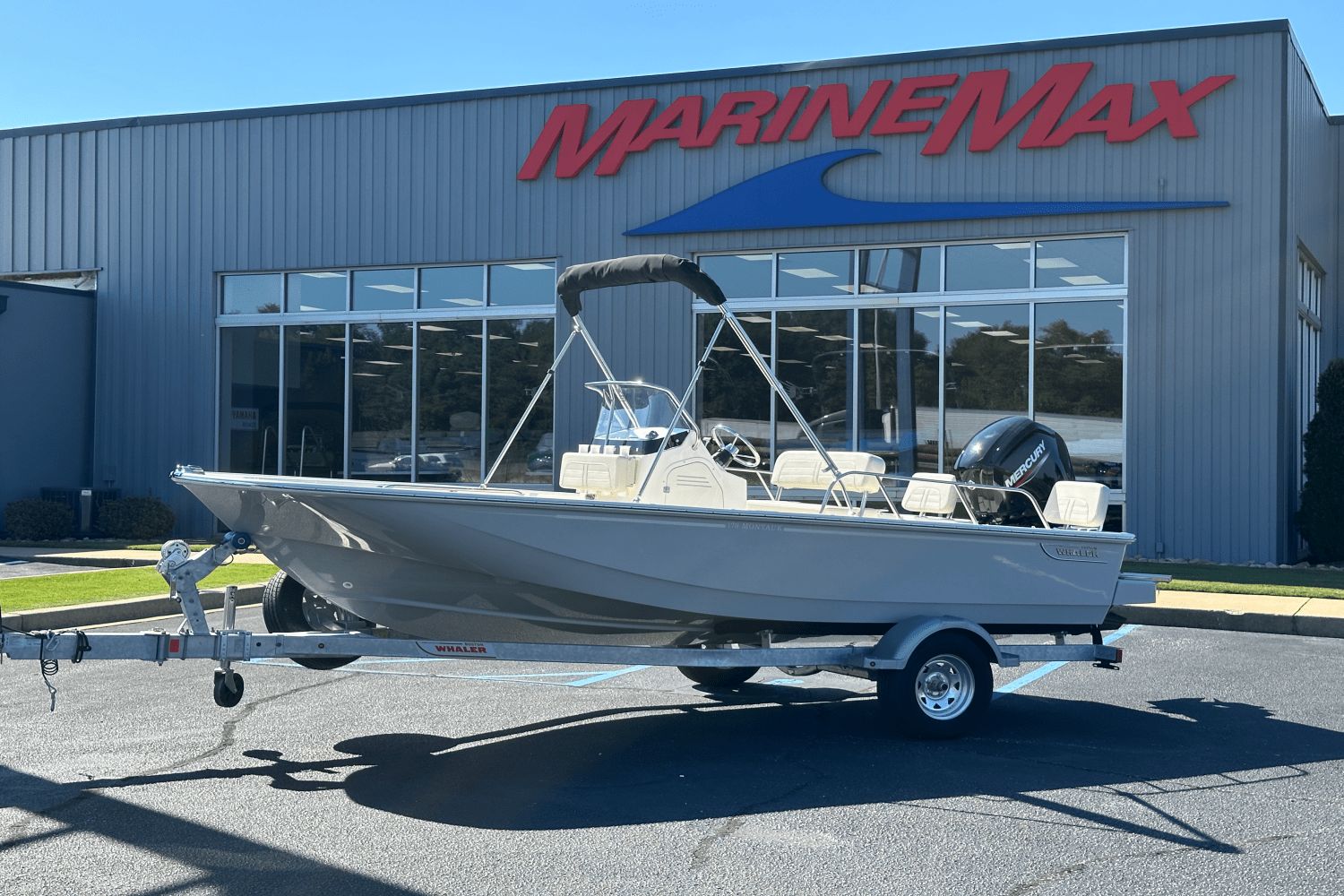 Boston Whaler 170 Montauk 2026 Boston Whaler 170 Montauk boat on trailer outside MarineMax dealership.