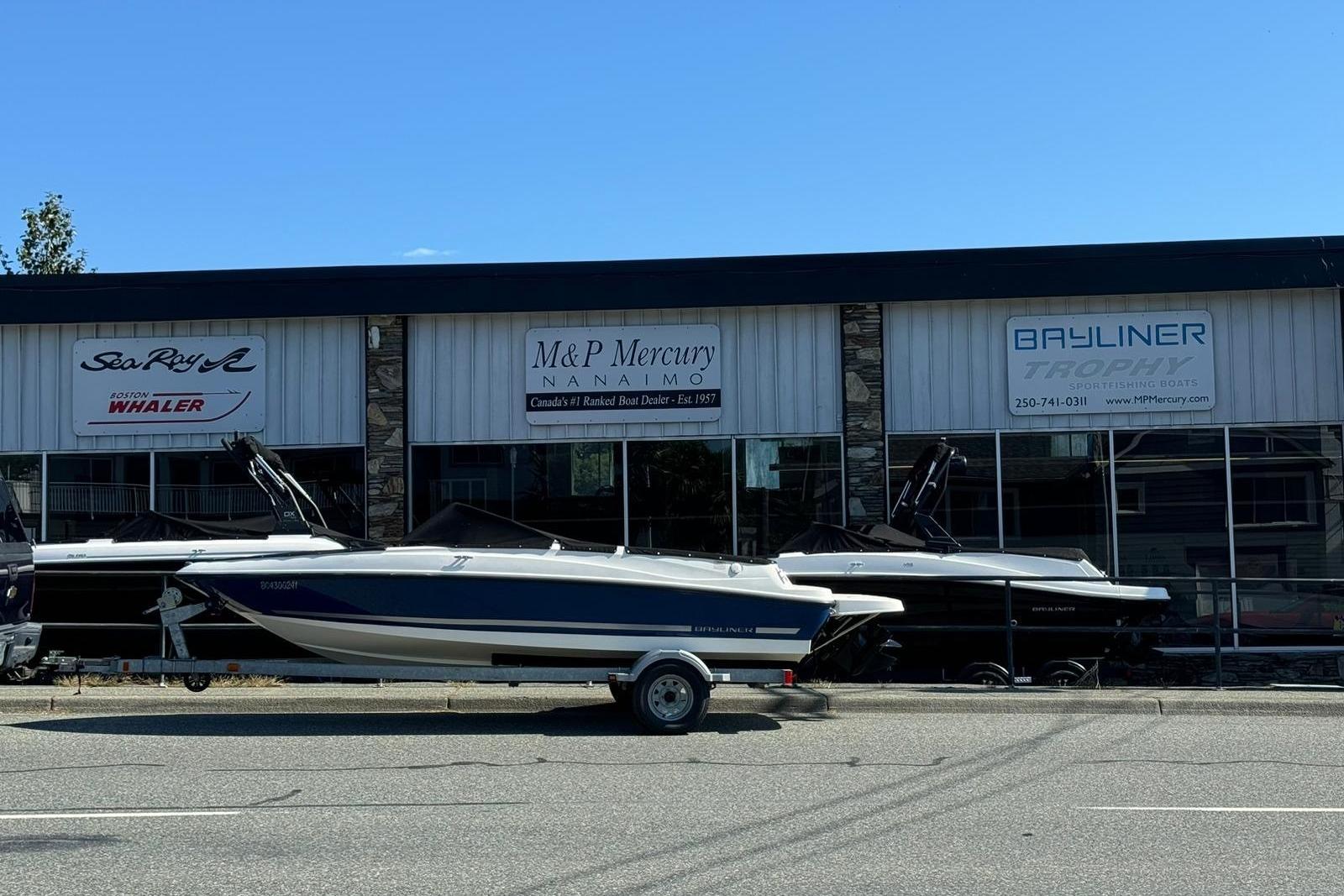 Bayliner 175 Bowrider 2014 Bayliner 175 Bowrider on trailer outside M&P Mercury dealership.