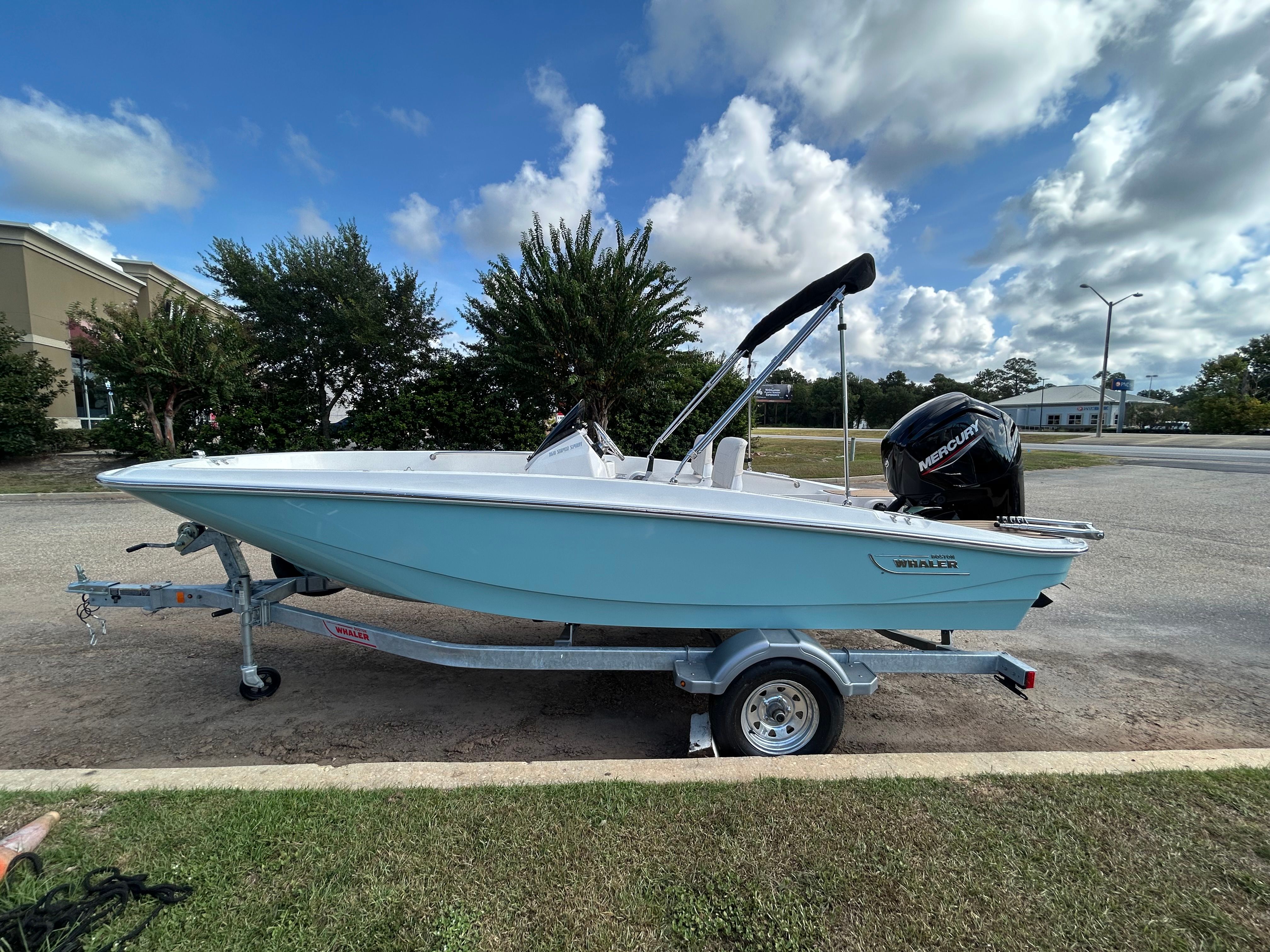Boston Whaler 160 Super Sport 2026 Boston Whaler 160 Super Sport boat on trailer, parked outdoors under a cloudy sky.
