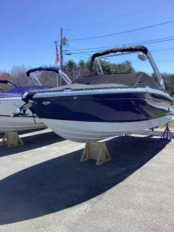 Cobalt R6 2025 Cobalt R6 boat displayed outdoors on wooden stands.