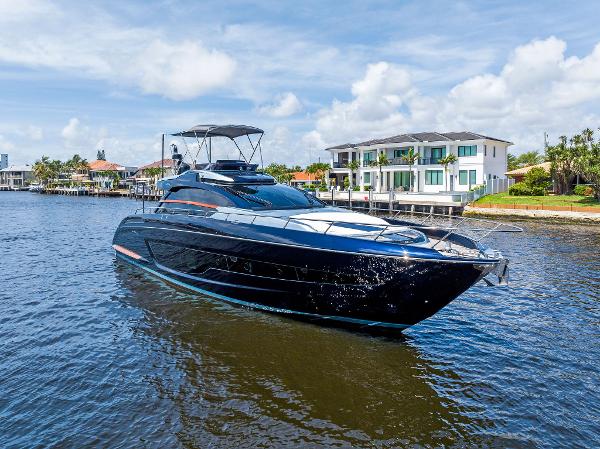 Riva 66' Ribelle 2020 Riva 66' Ribelle yacht cruising near waterfront homes.