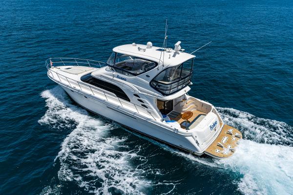 Sea Ray 560 Sedan Bridge 2001 Sea Ray 560 Sedan Bridge yacht cruising on open blue waters.