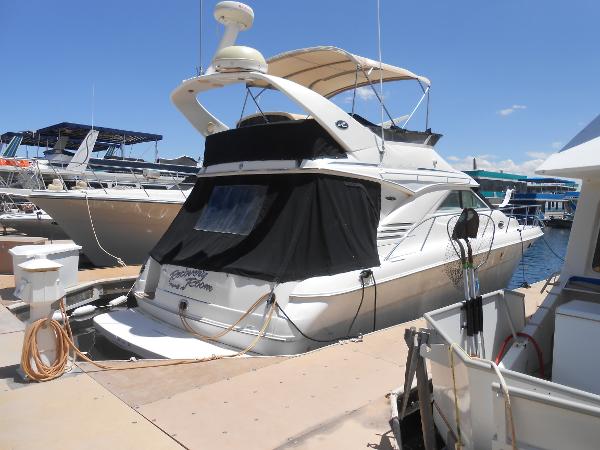 Sea Ray 400 Sedan Bridge 2002 Sea Ray 400 Sedan Bridge yacht docked at marina.