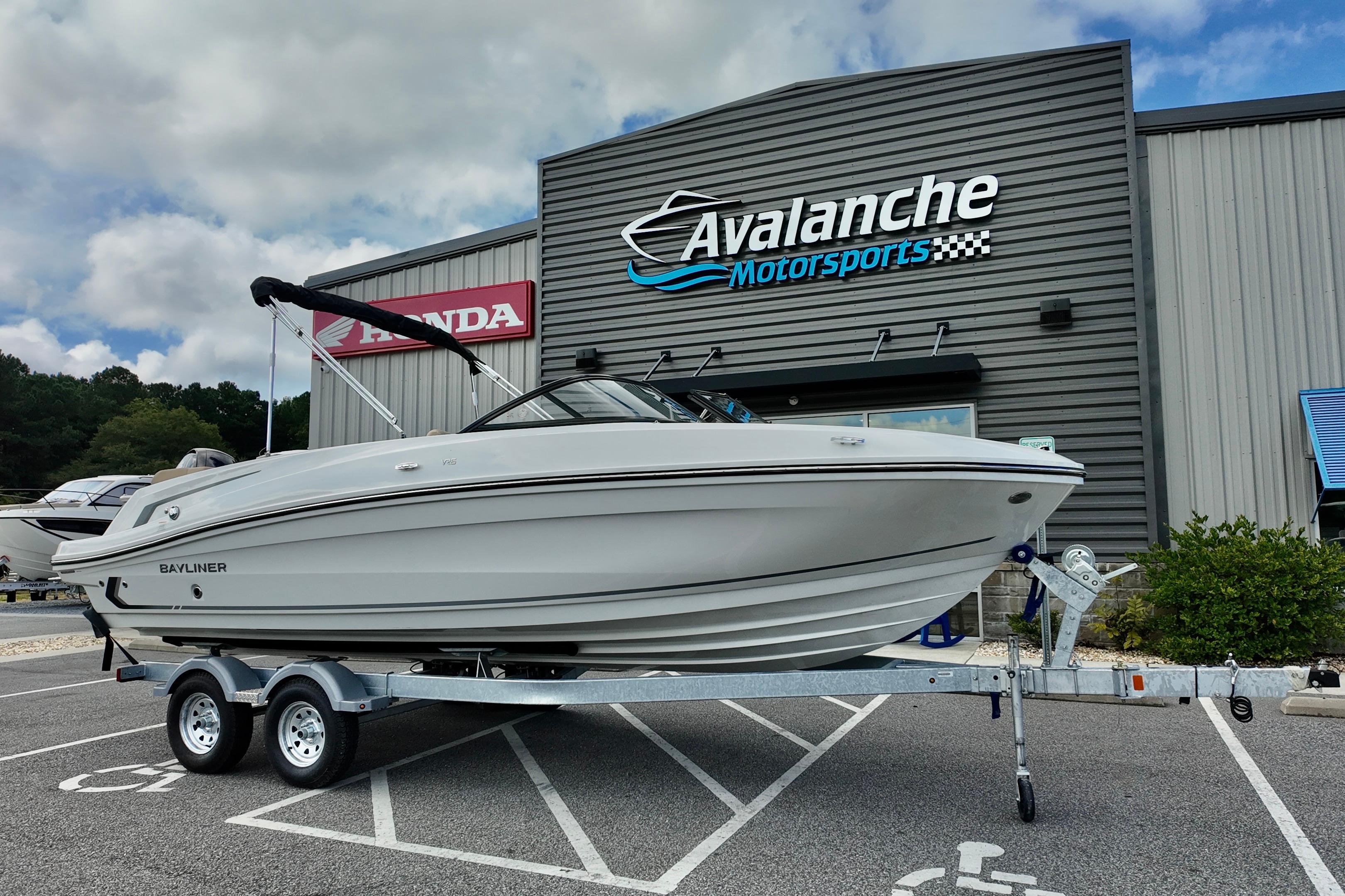 Bayliner VR6 2026 Bayliner VR6 boat on trailer at Avalanche Motorsports dealership.