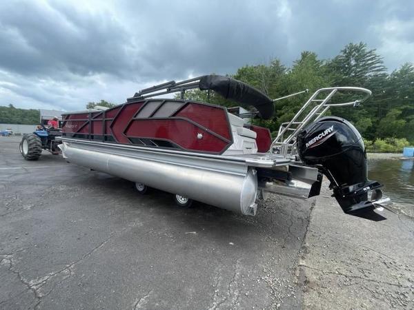 Crest Caribbean LX 230 SLS CP3 2023 Crest Caribbean LX 230 SLS pontoon boat with Mercury outboard motor.