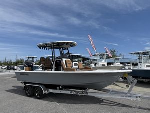 Sea Pro 230 Bay 2026 Sea Pro 230 Bay boat on trailer under clear blue sky.