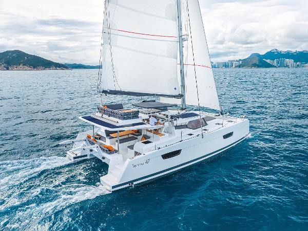 Fountaine Pajot Tanna 47 2024 Fountaine Pajot Tanna 47 sailing catamaran cruising on open water.