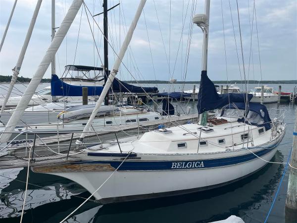 Bayfield 36 Cutter Bayfield 36 Cutter 1989 sailboat named Belgica docked at marina.