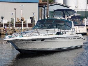 Sea Ray 400 Express Cruiser 1995 Sea Ray 400 Express Cruiser docked at a marina.