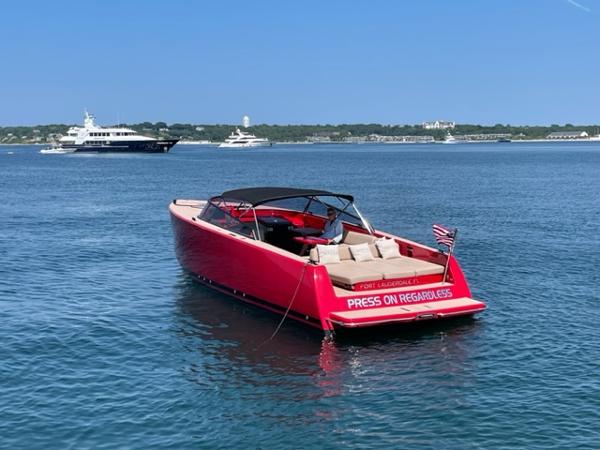 VanDutch 40 Red 2010 VanDutch 40 yacht named Press On Regardless on calm waters.