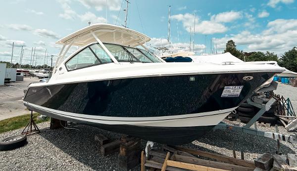 Pursuit DC 266 Dual Console 2020 Pursuit DC 266 Dual Console boat on display at a marina.