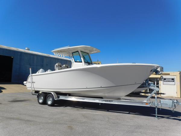 Sailfish 272 CC 2024 Sailfish 272 CC center console boat on a trailer.