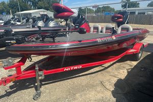 Nitro Z-6 2011 Nitro Z-6 boat on red trailer, equipped with Minn Kota trolling motor.