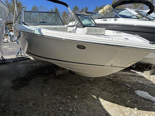 Cobalt CS22 2023 Cobalt CS22 boat on display outdoors, showcasing sleek design and modern features.