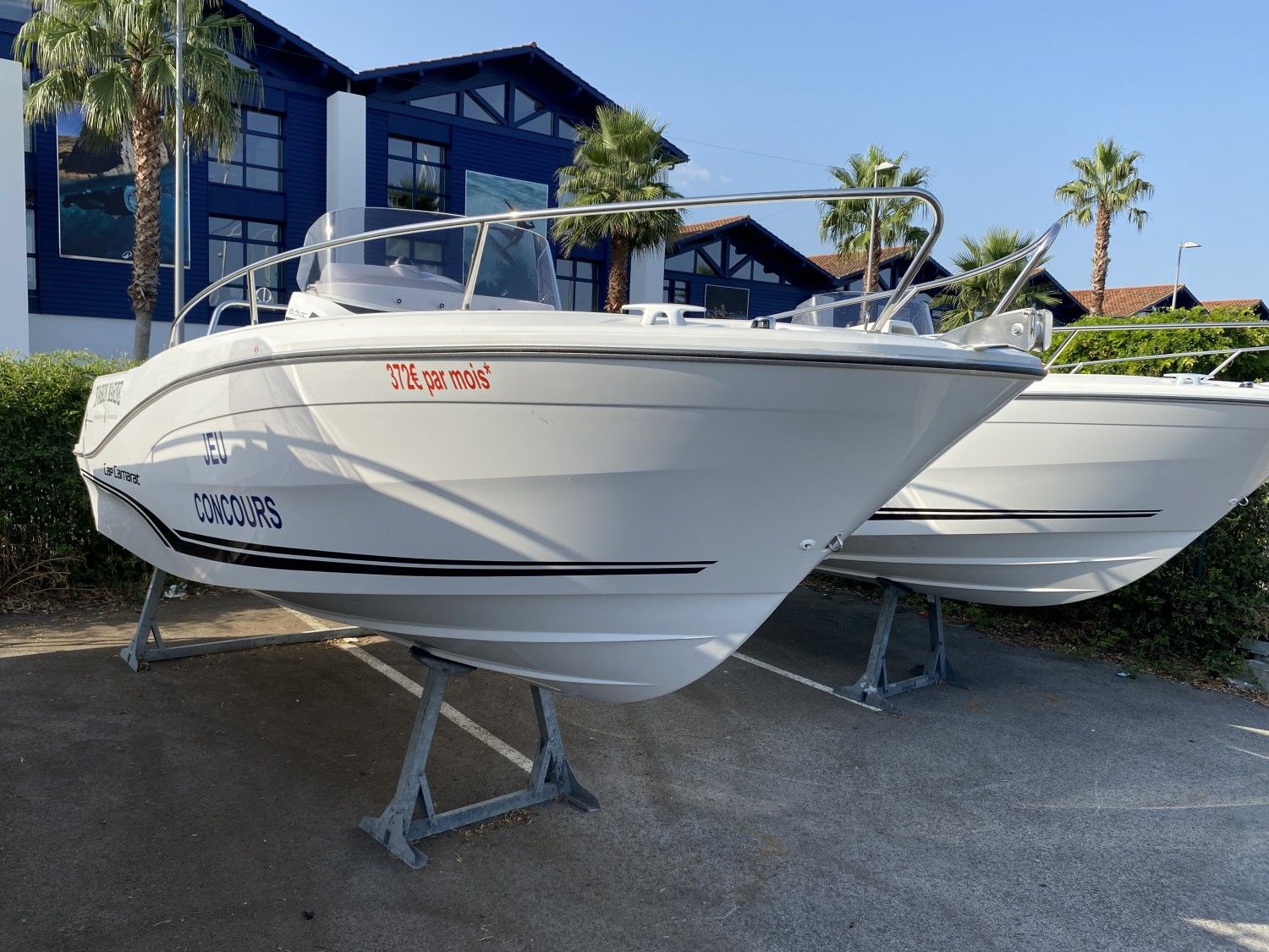 Jeanneau CAP CAMARAT 6.5 CC Série 3 2025 Jeanneau CAP CAMARAT 6.5 CC Série 3 boat displayed outdoors.