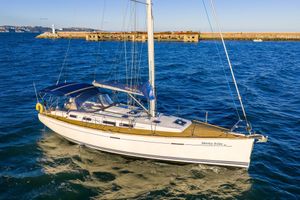 Dufour 425 Grand Large Sailing yacht Dufour 425 Grand Large 2007 cruising on blue ocean waters.