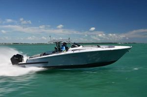 Canados 435 GLADIATOR 2023 Canados 435 GLADIATOR cruising on turquoise waters under a clear blue sky.