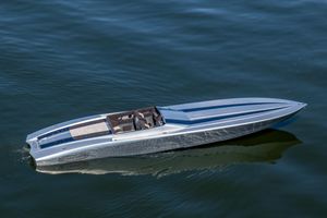 Outerlimits SL-50 2020 Outerlimits SL-50 speedboat cruising on calm blue water.