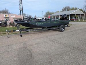 Ranger RT188P 2023 Ranger RT188P boat on trailer, parked outdoors near buildings.