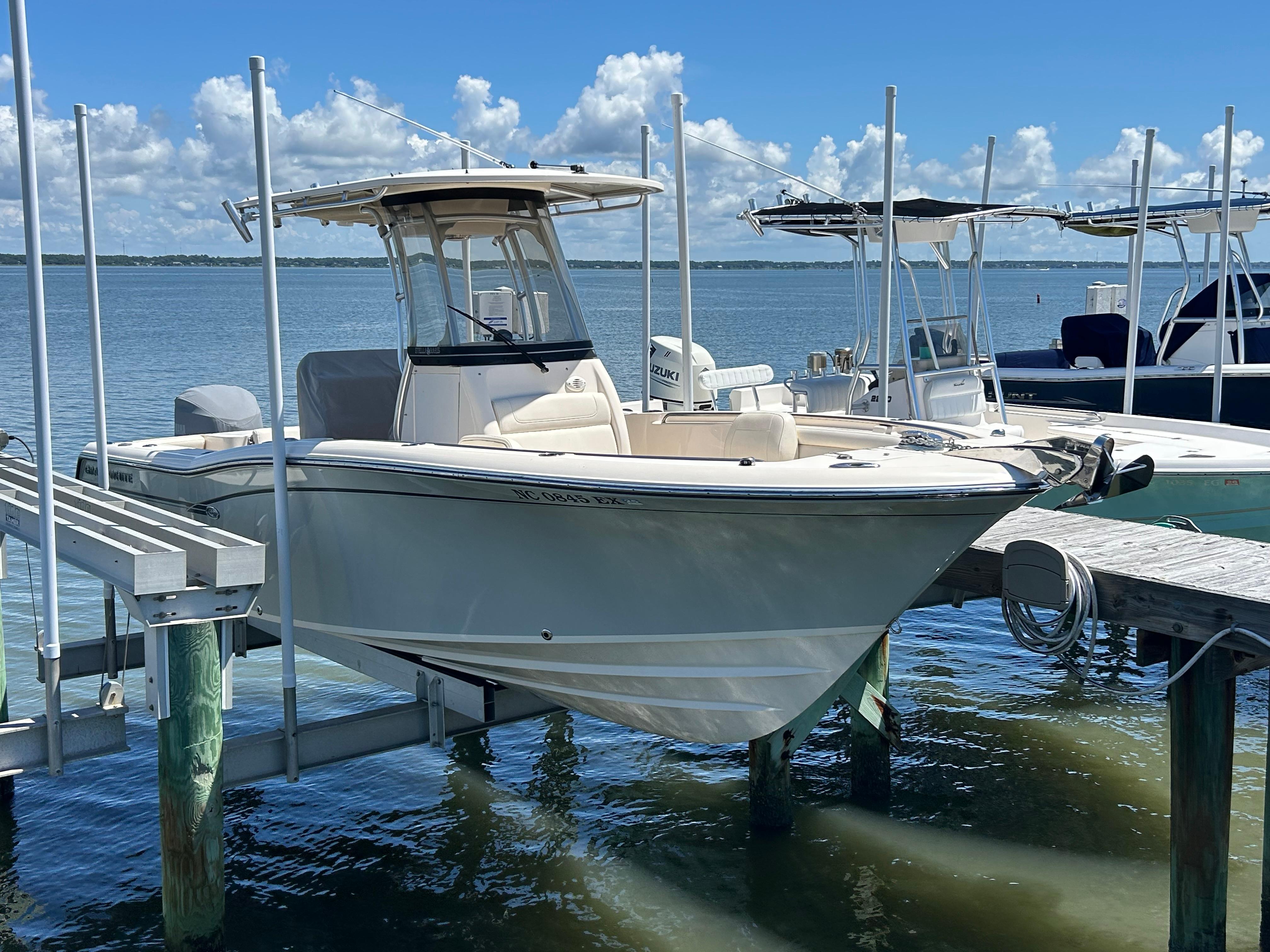 Grady-White Fisherman 236 2019 Grady-White Fisherman 236 boat docked on a sunny day by the water.