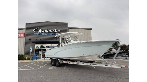 Sea Fox 288 Commander 2025 Sea Fox 288 Commander boat on trailer outside Avalanche Motorsports building.